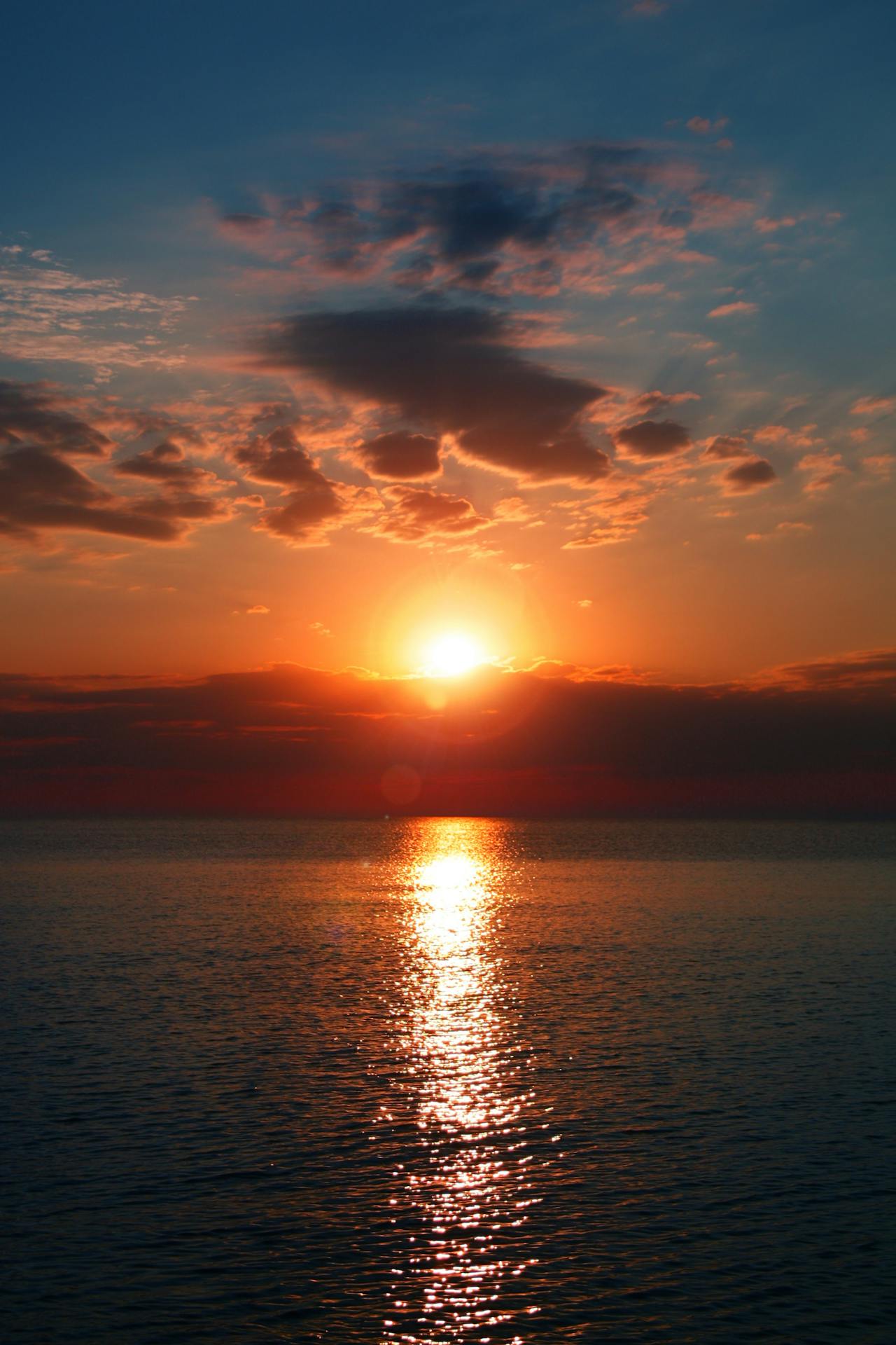 Image of sunset at the sea boat view